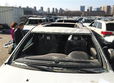 天津港爆炸受损车“洗白”入市 低于市价数十万