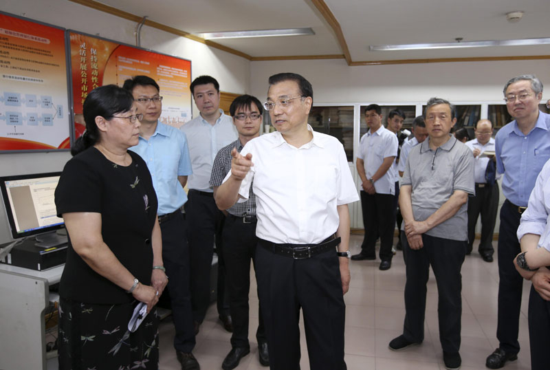 李克强考察建行、央行并主持召开金融系统座谈会 
